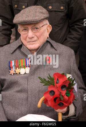 Elderly war veteran attending the 2015 Remembrance Day commemoration in Haslemere, Surrey, UK. Stock Photo
