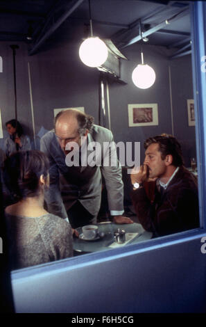 Jan 11, 2002; Madrid, SPAIN; (from left to right) LAURA MORANTE as Yolanda, Director JOHN MALKOVICH, and JAVIER BARDEM as Det. Lt. Agustin Rejas on the set of the crime, thriller, drama ''The Dancer Upstairs.'' Stock Photo