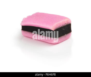 One pink liquorice allsorts candy isolated on white background Stock Photo