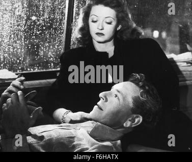 1946, Film Title: DECEPTION, Director: IRVING RAPPER, Studio: WARNER, Pictured: BETTE DAVIS, PAUL HENREID. (Credit Image: SNAP) Stock Photo