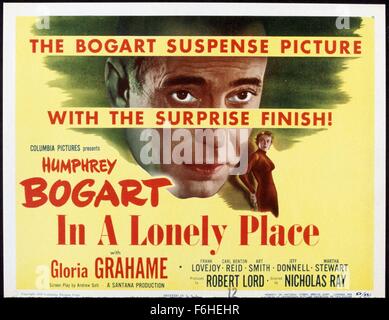 1950, Film Title: IN A LONELY PLACE, Director: NICHOLAS RAY, Studio: COLUMBIA, Pictured: HUMPHREY BOGART, GLORIA GRAHAME, MALE GAZE, VOYEUR, TITLE CARD. (Credit Image: SNAP) Stock Photo