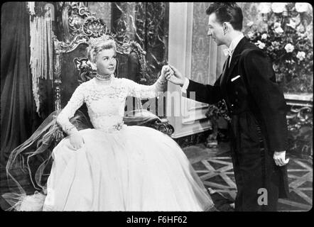 1953, Film Title: CALL ME MADAM, Director: WALTER LANG, Studio: FOX, Pictured: JEWELLERY, DONALD O'CONNOR, VERA-ELLEN, LADY, THRONE, TIARA, HAND KISSING, GENTLEMAN, WEALTHY, RICH, MANNERS, POLITE, FORMAL, ROYAL, PRINCESS, QUEEN. (Credit Image: SNAP) Stock Photo