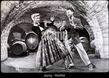 1953, Film Title: CALL ME MADAM, Director: WALTER LANG, Studio: FOX, Pictured: DANCING COUPLES, DONALD O'CONNOR, VERA-ELLEN, ARCH WALL, CELLAR, KEG, WINE, BEER, WINERY, UNDERGROUND, DANCING, MUSICAL. (Credit Image: SNAP) Stock Photo