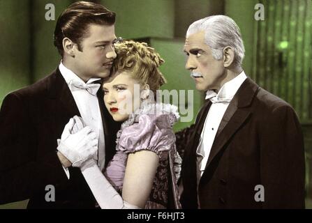 1944, Film Title: CLIMAX, Director: GEORGE WAGGNER, Studio: UNIVERSAL, Pictured: TURHAN BEY, SUSANNA FOSTER, BORIS KARLOFF, LOVE (TRIANGLE), DECEPTION, PROTECTING, PROTECTION, UPSET, EMBRACE, CONSOLING, DEFENDING, CONFLICT, INTIMIDATING, MOUSTACHE, EVIL. (Credit Image: SNAP) Stock Photo