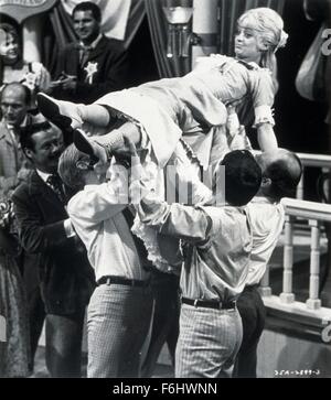 1968, Film Title: ONE AND ONLY, GENUINE, ORIGINAL FAMILY BAND, Director: MICHAEL O'HERLIHY, Studio: BUENA VISTA, Pictured: DANCING LADIES, GOLDIE HAWN, PERIOD COSTUME, CROWD SURFING, SURROUNDED BY MEN, LIFTING, PICKING UP, CARRYING, DANCER, MUSICAL. (Credit Image: SNAP) Stock Photo