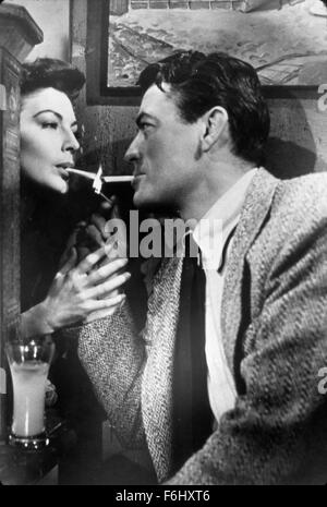 1952, Film Title: SNOWS OF KILIMANJARO, Director: HENRY KING, Studio: FOX, Pictured: ACCESSORIES, CIGARETTE, AVA GARDNER, HENRY KING, GREGORY PECK. (Credit Image: SNAP) Stock Photo