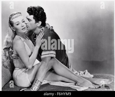 1955, Film Title: PRODIGAL, Director: RICHARD THORPE, Studio: MGM, Pictured: CLOTHING, EMBRACE, PERIOD COSTUME, EDMUND PURDOM, ROMANCE, RICHARD THORPE. (Credit Image: SNAP) Stock Photo