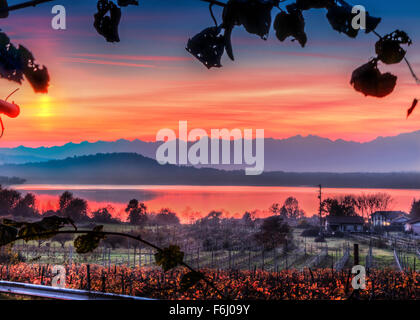 Red sunset over Lake Viverone in Piedmont, Italy Stock Photo