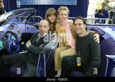Mar 09, 2003; Hollywood, CA, USA; FRENCH STEWART as Inspector Gadget, CAITLIN WACHS as Penny, and ELAINE HENDRIX as G2 in the action, family, comedy ''Inspector Gadget 2'' pose with director ALEX ZAMM. Stock Photo