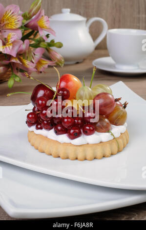 Dessert of sand tarts with whipped cream and fresh fruit Stock Photo