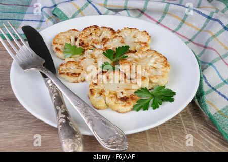 Warm appetizer of fried pieces of cauliflower Stock Photo