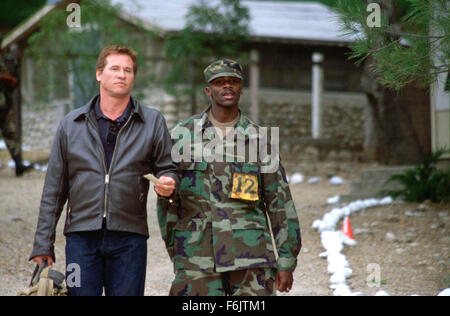 RELEASE DATE: March 12, 2004. MOVIE TITLE: Spartan. STUDIO: ApolloMedia. PLOT: The investigation into a kidnapping of the daughter of a high-ranking US government official. PICTURED: VAL KILMER as Scott and DEREK LUKE as Curtis. Stock Photo