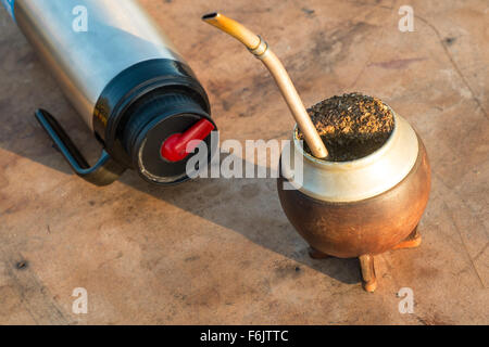 Traditional mate drinking equipment on a rustic table Stock Photo