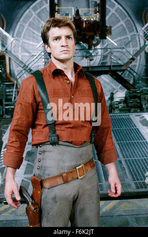 RELEASE DATE: September 30, 2005. MOVIE TITLE: Serenity. STUDIO: Universal Pictures. PLOT: The crew of the ship Serenity tries to evade an assassin sent to recapture one of their number who is telepathic. PICTURED: NATHAN FILLION stars as Captain Malcolm Reynolds. Stock Photo