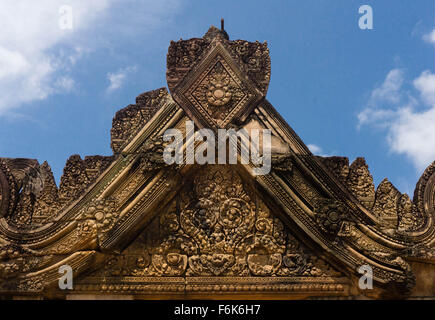 Angkor, Cambodia: Detail of a sandstone relief carving at Banteay Srei Temple. Stock Photo