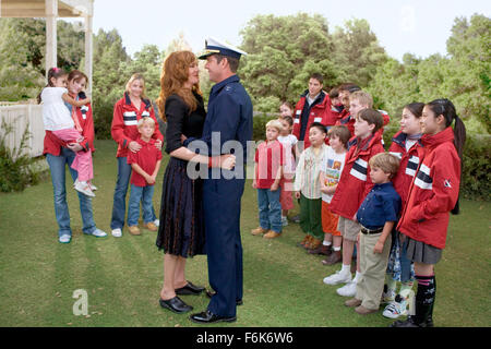 RELEASE DATE: November 23, 2005. MOVIE TITLE: Yours, Mine and Ours. STUDIO: Paramount Pictures. PLOT: A widowed Coast Guard Admiral and a widow handbag designer fall in love and marry, much to the dismay of her 10 and his 8 children. PICTURED: DENNIS QUAID as Frank and RENE RUSSO as Helen. Stock Photo