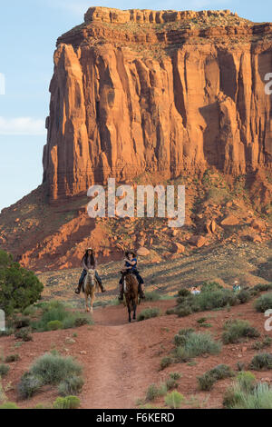 Horseback riding in Monument Valley, Utah Stock Photo