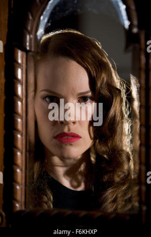 RELEASE DATE: September 15, 2006. MOVIE TITLE: The Black Dahlia. STUDIO: Universal Pictures. PLOT: Two policemen see their personal and professional lives fall apart in the wake of theBlack Dahlia murder investigation. PICTURED: HILARY SWANK as Madeleine Linscott. Stock Photo