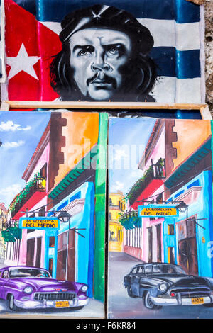 Ernesto Che Guevara image and painting before Cuban Flag, Oil Painting of Che, Street Scene in oil, souvenirs, Street Scene, Stock Photo