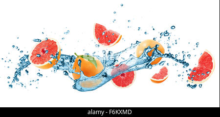 grapefruits in water splash isolated on the white background. Stock Photo