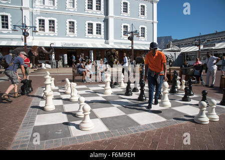 Players enjoy a game of street chess on the Waterfront in Cape Town South Africa Stock Photo