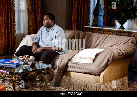 RELEASE DATE: November 20, 2009. MOVIE TITLE: The Blind Side. STUDIO: Alcon Entertainment. PLOT: The story of Michael Oher, a homeless and traumatized boy who became an All American football player and first round NFL draft pick with the help of a caring woman and her family. PICTURED: QUINTON AARON as Michael Oher. Stock Photo