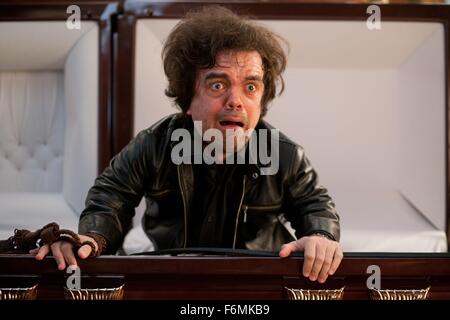 RELEASE DATE: April 16, 2010. MOVIE TITLE: Death At A Funeral. STUDIO: Parabolic Pictures Inc. PLOT: A funeral ceremony turns into a debacle of exposed family secrets and misplaced bodies. PICTURED: PETER DINKLAGE as Frank. Stock Photo