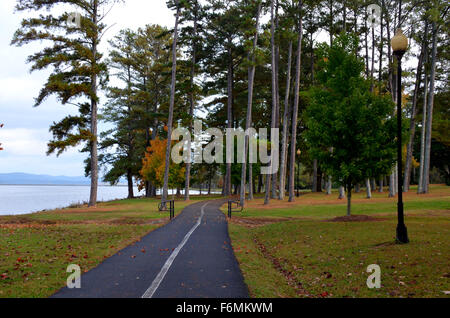 Paved walking, jogging trail through a park located in Guntersville, AL, USA Stock Photo