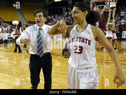 Las Cruces, NM, USA. 17th Nov, 2015. New Mexico State head coach Mark Trakh, left, celebrates with player Abby Scott the 78-59 victory over New Mexico at the end of an NCAA college basketball game in Las Cruces, N.M., Tuesday, Nov. 17, 2015. © Andres Leighton/Albuquerque Journal/ZUMA Wire/Alamy Live News Stock Photo