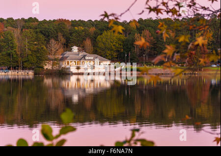 Atlanta Evergreen Lakeside Resort's Stone Mountain Golf Club clubhouse basking in the beautiful colors of an Autumn evening. Stock Photo