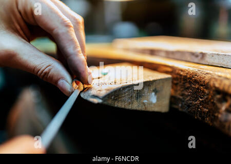 Jeweler working on ring in his workshop Stock Photo