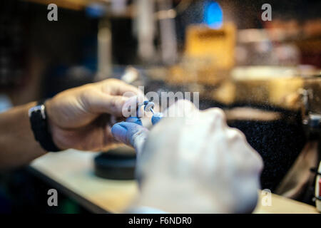 Inhaling dust particles flying around during work may be dangerous Stock Photo