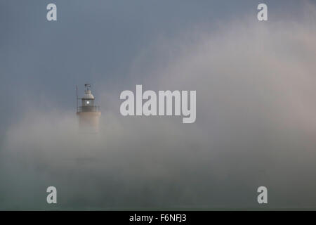 Newhaven, Sussex, UK. 17th Nov, 2015. Gusting winds of Storm Barney cause huge waves to crash over the lighthouse at Newhaven in East Sussex, UK, Tuesday November 17, 2015. Parts of southern Britain were subject to a yellow weather warning from the Met Office for winds gusting up to 80miles an hour. Barney is only the second storm to be named. Credit:  Luke MacGregor/Alamy Live News Stock Photo