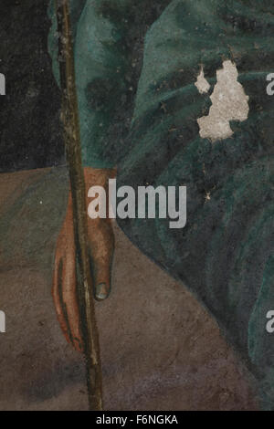 Close view of a man's hand holding a shepherd's hook.Wallpainting entitled  'Drop asleep shepherdess' by Manos Papamalis. Lemnos Stock Photo