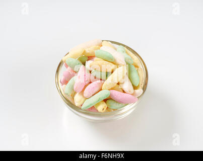 Puffed Rice Colorful bowl of colorful puffed rice on white background Stock Photo - Alamy