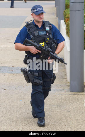 Armed British London Met or Metropolitan police officer in uniform at ...