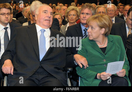 FILE - An archive picture, dated 5 May 2010, shows German Chancellor Angela Merkel (CDU, R) with former Chancellor Helmut Kohl (CDU) during a festive event celebrating Kohl's 80th birthday in Ludwigshafen, Germany. Photo: Ronald Wittek /dpa Stock Photo