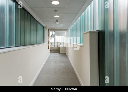 Modern corridor with glass walls Stock Photo