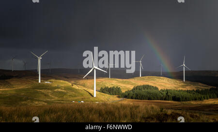 Rainbow and sunlight hit the windfarms on the Myherin stage of Wales Rally GB 2015 Stock Photo