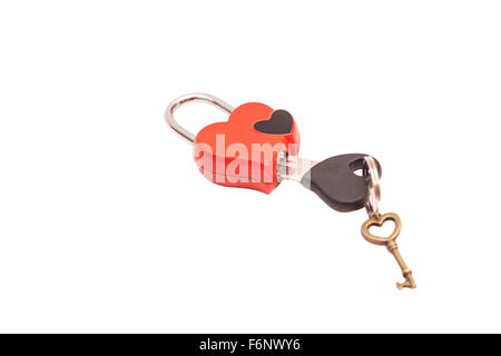 Red heart shaped padlock and keys isolated on white Stock Photo