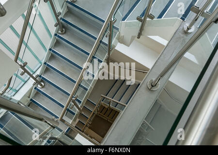 Modern staircase with glass walls Stock Photo