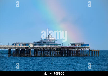 Rainbow over Llandudno pier, Conwy, Wales, UK Stock Photo