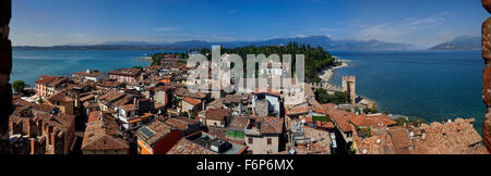 Panoramic view on ancient city Sirmione, beautiful lake Garda and Italian Alps from Scaliger Castle (Italy) Stock Photo