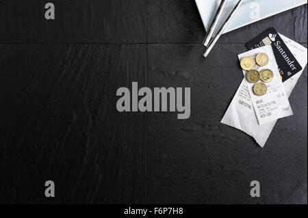 Overhead view of cafe table.Restaurant leaving a gratuity and bill paying. Leaving a tip after a meal. Stock Photo