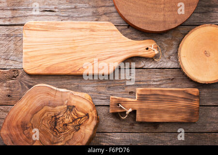 Wooden background with plenty of cutting boards Stock Photo