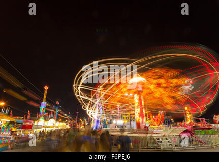 The Orbiter ride and midway games at the Canadian National Exhibition (CNE). Toronto, Ontario, Canada. Stock Photo