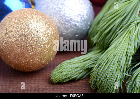 Decorated christmas tree - holiday background, green tree eve branch close up with christmas balls Stock Photo