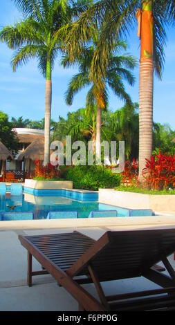 Beautiful adults only pool with bali beds at a resort in the Riviera