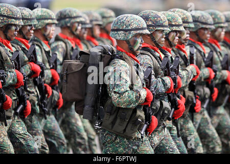 Pampanga Province, Philippines. 21st Dec, 2015. Soldiers march during a parade in celebration of the 80th founding anniversary of the Armed Forces of the Philippines inside the Clark Air Base in Pampanga Province, the Philippines, Dec. 21, 2015. Credit:  Rouelle Umali/Xinhua/Alamy Live News Stock Photo