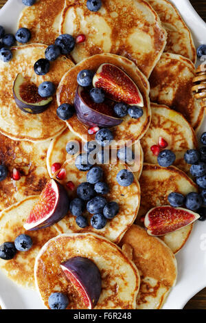 pancakes with blueberries and honey, top